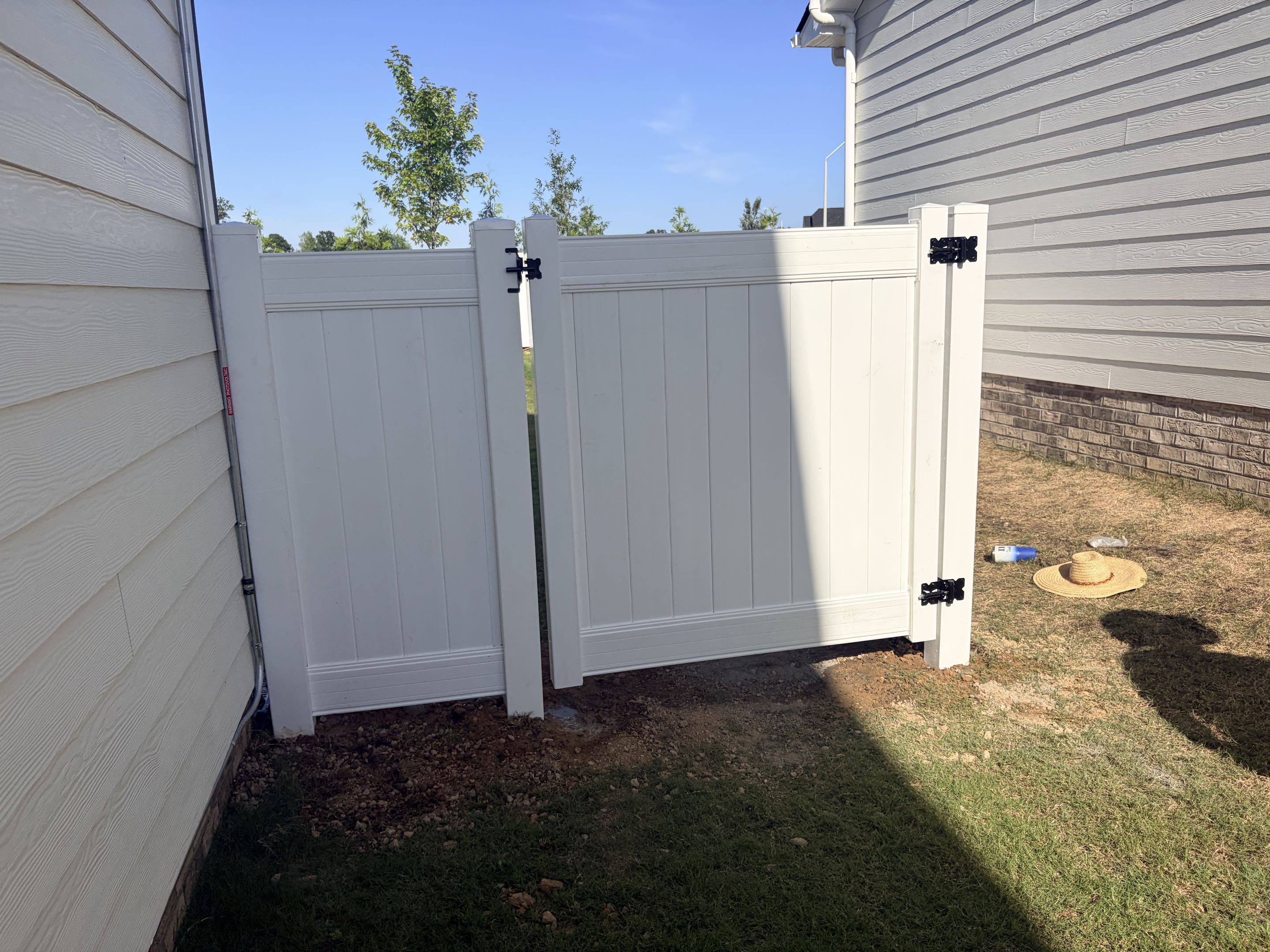 Knightdale, NC - We installed a 130-foot white vinyl privacy fence, standing 5 feet tall, to enhance the curb appeal of the property. The fence was meticulously measured, cut, and assembled to meet the homeowner's needs and adhere to the HOA guidelines. The vinyl material was chosen for its durability, low maintenance, and aesthetic appeal. The result is a beautiful, functional fence that adds privacy and enhances the overall look of the property.