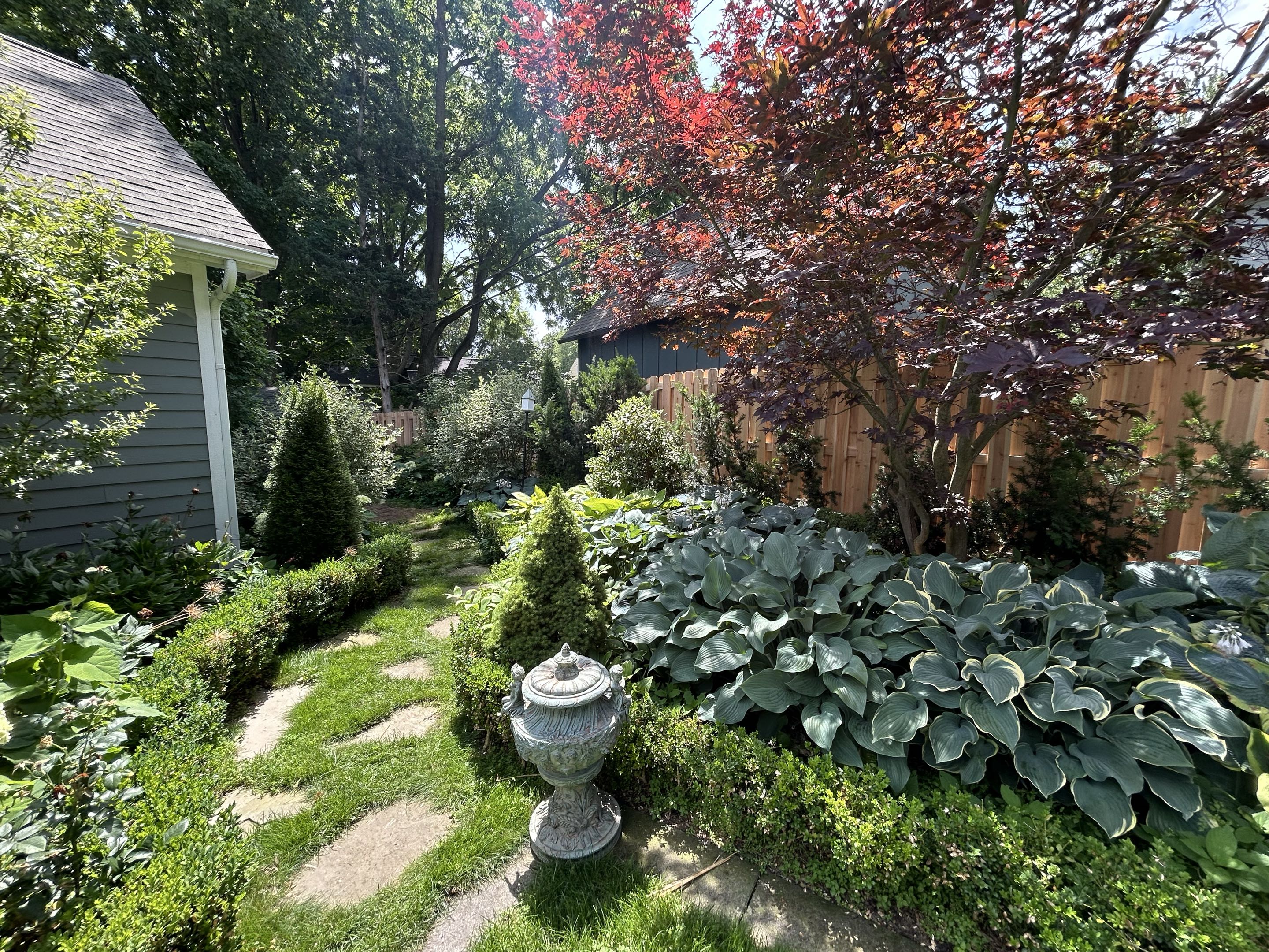 Ann Arbor, MI - Top Rail Fence Ann Arbor was near Miller Park installing this cedar Shadowbox fence.  The customer was concerned about digging because they are an avid gardener so we did this with Postmasters steel posts driven deep into the ground.  The results are stunning.