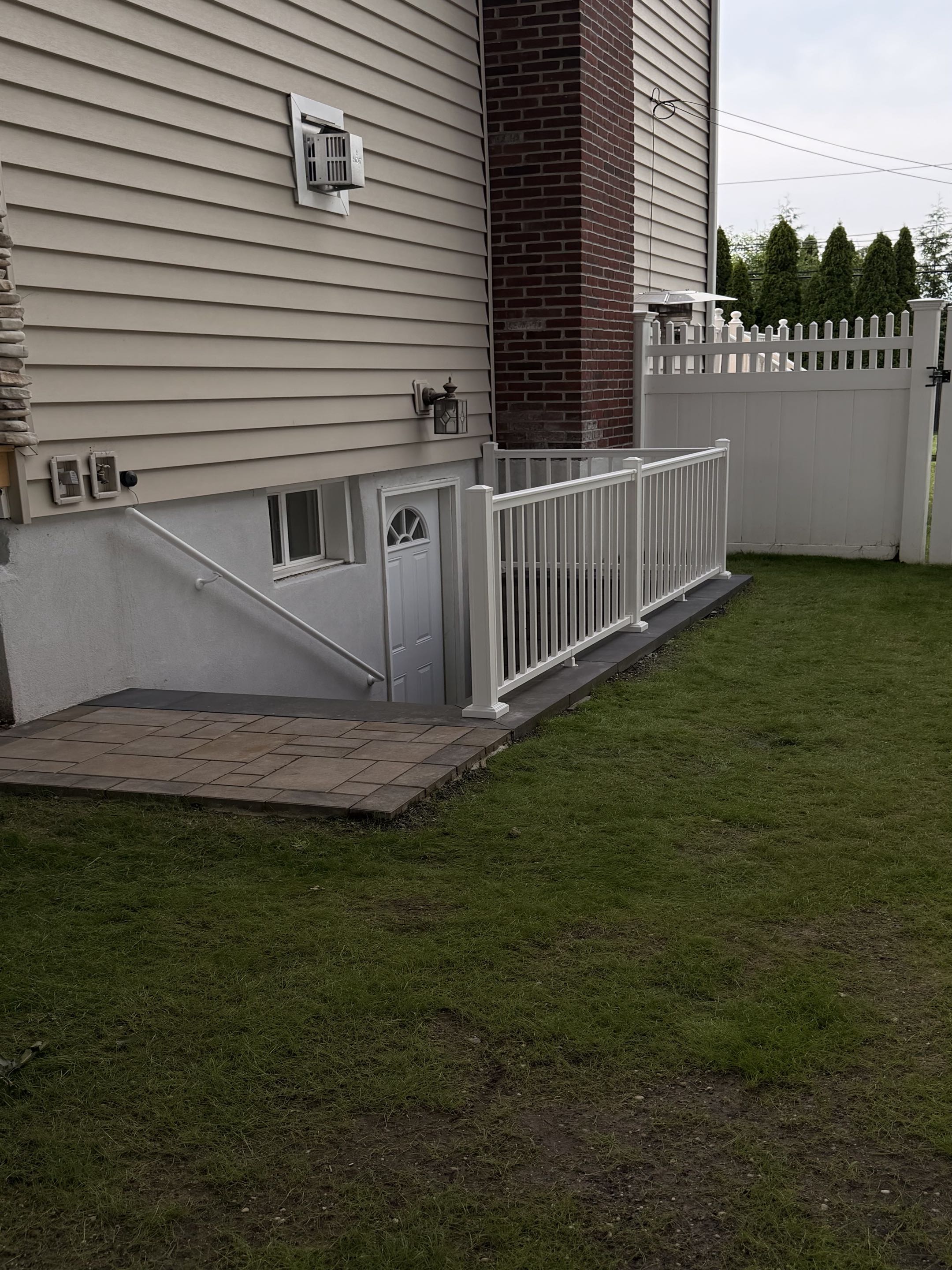 Hauppauge, NY - Beautiful 3 foot wide aluminum railing install installed for a wonderful homeowner in Hauppauge, New York. Clean lines. Quality install. #whitealuminumrailings #outdoorrailing
