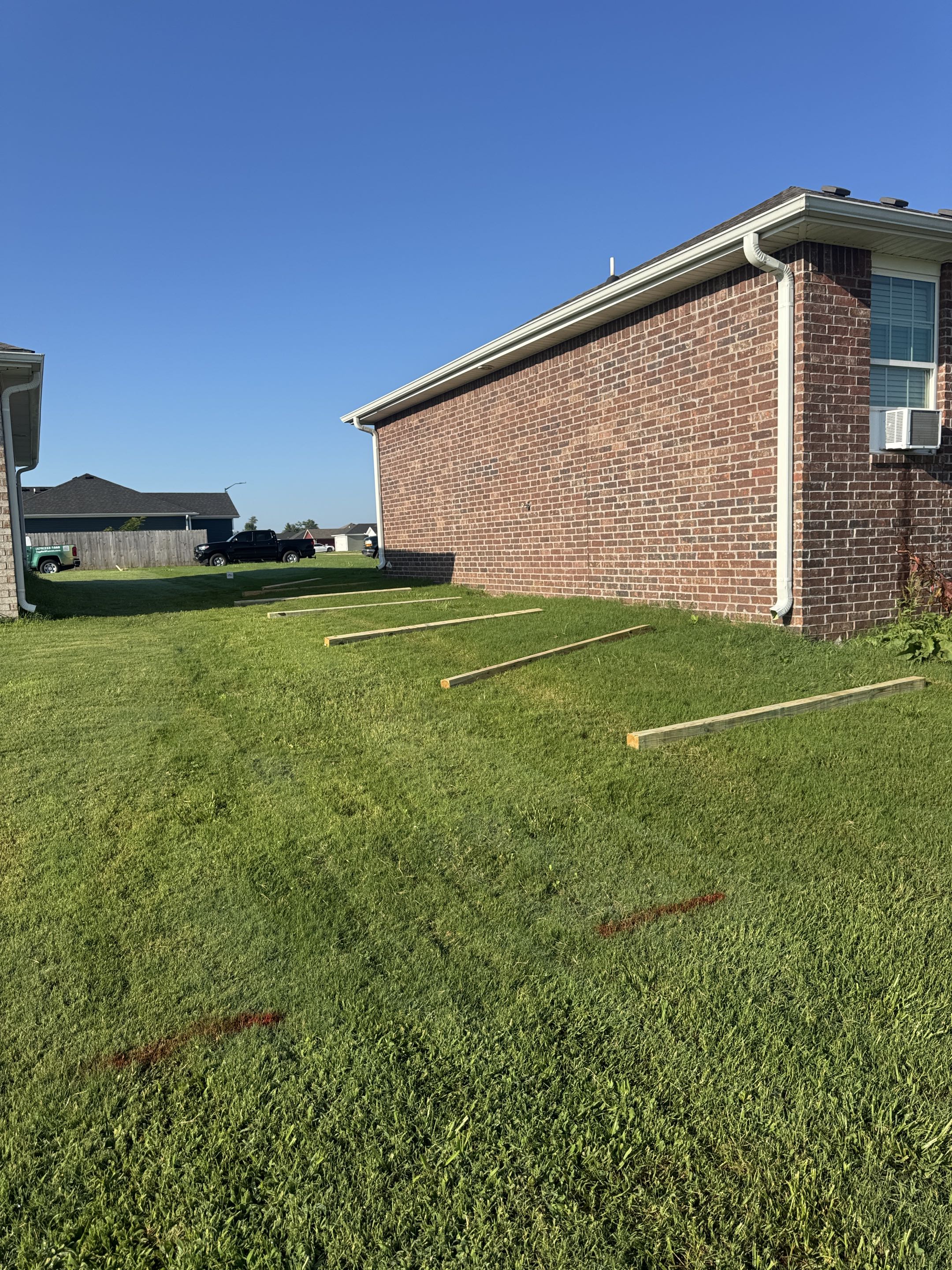 Siloam Springs, AR - Prepping for a new 6’ cedar privacy fence in Siloam Springs! 