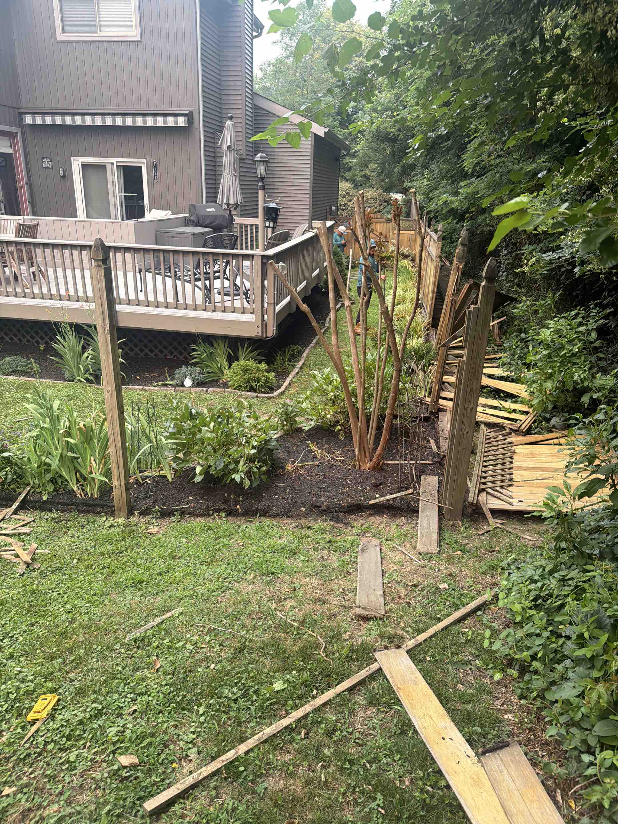 Moorestown, NJ - Ripping out old wood fence for a modernized grey vinyl with spindle top.