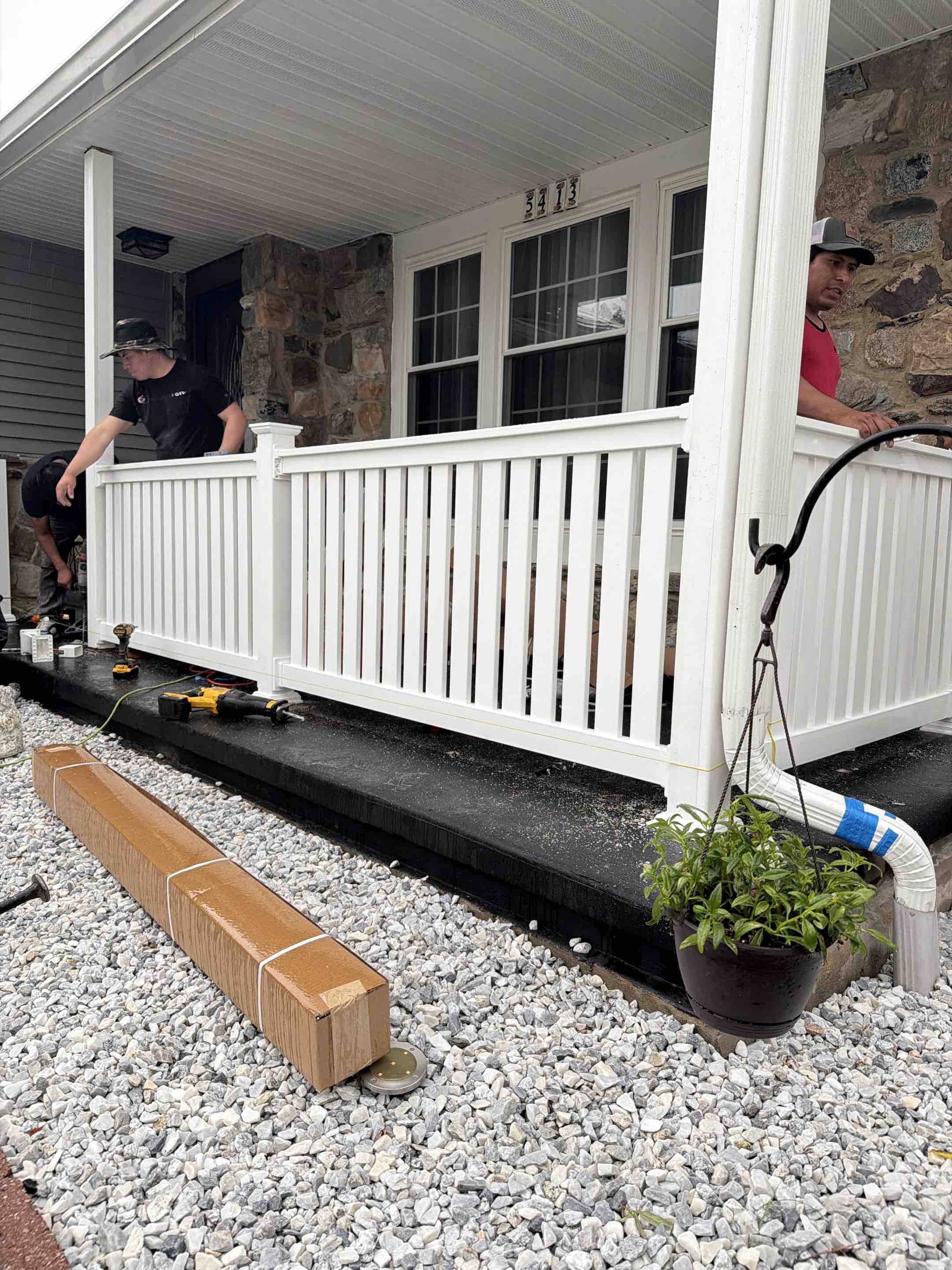 Pennsauken, NJ - Rainy railing installation 