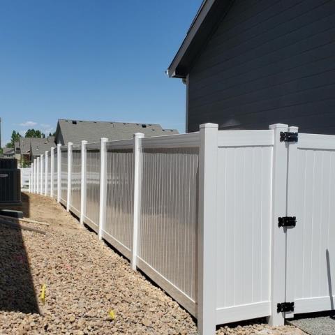 Fort Collins, CO - Vinyl privacy fence installed for a happy customer!