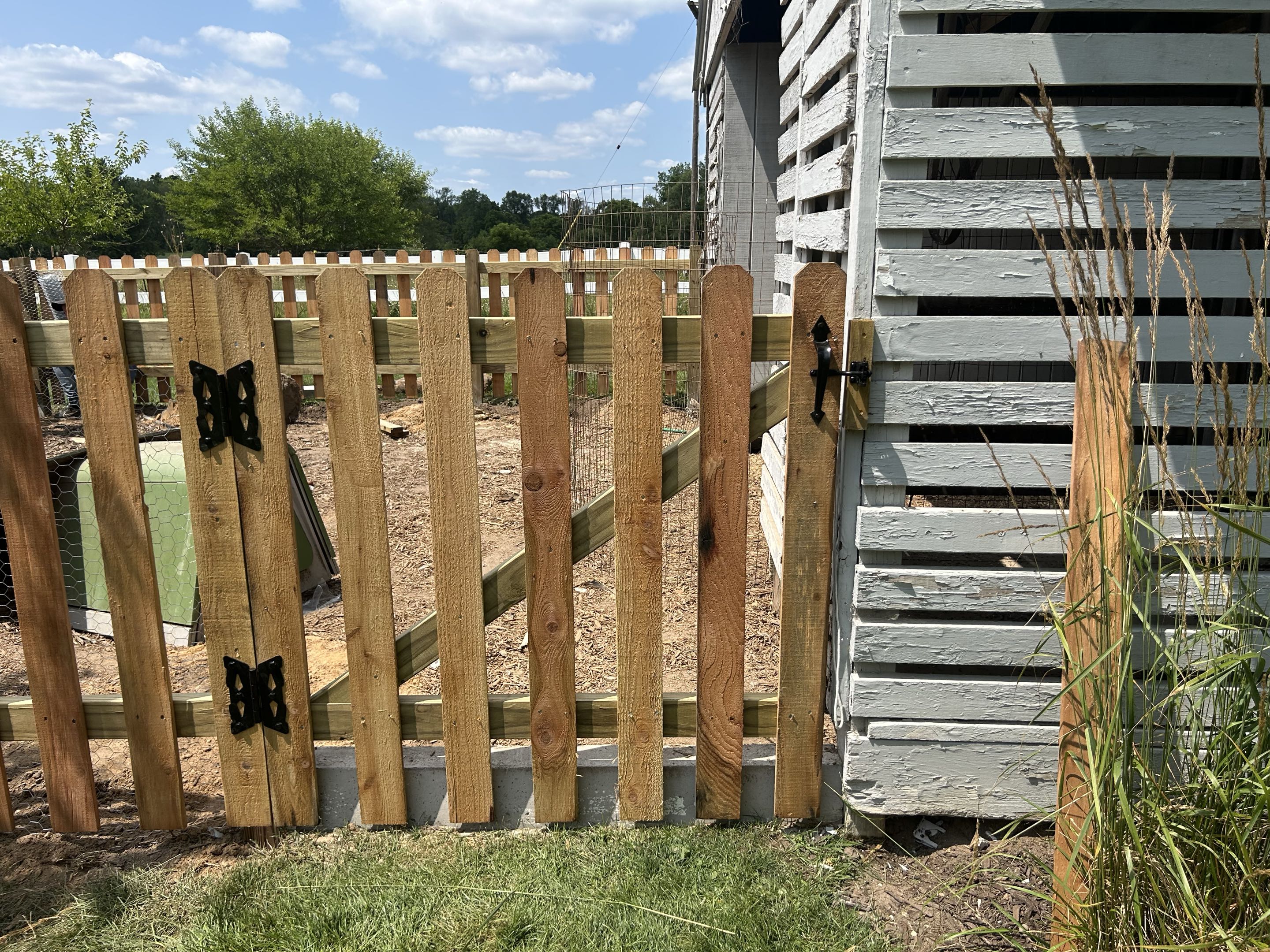 Dexter, MI - Top Rail Fence Ann Arbor is in Dexter, MI.  Replacing an old picket fence and chicken wire to protect the egg producers. 