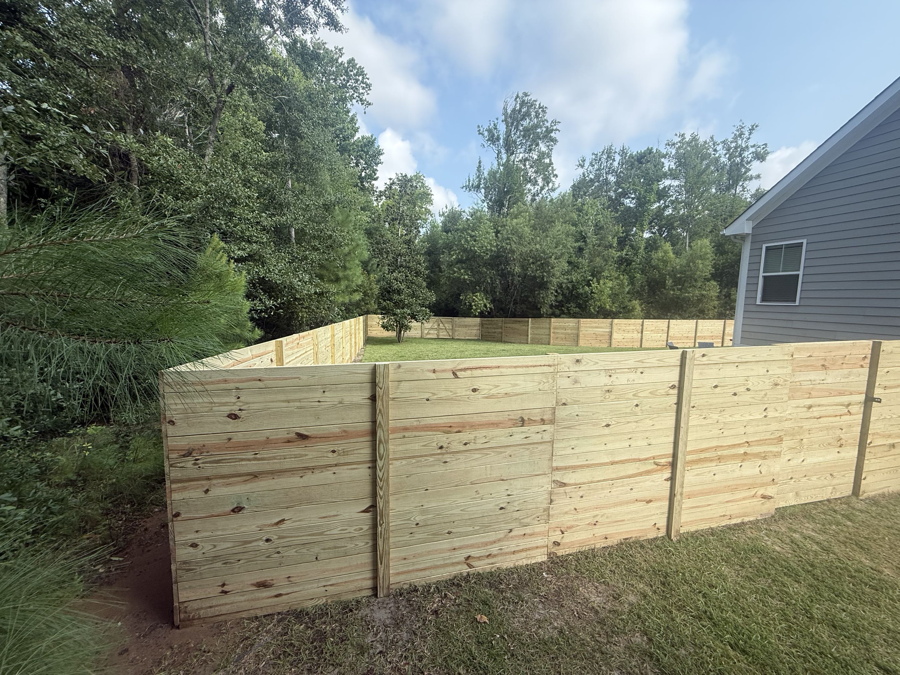 Wilmington, NC - 300ft of horizontal privacy fence, beautiful fence great job team! 