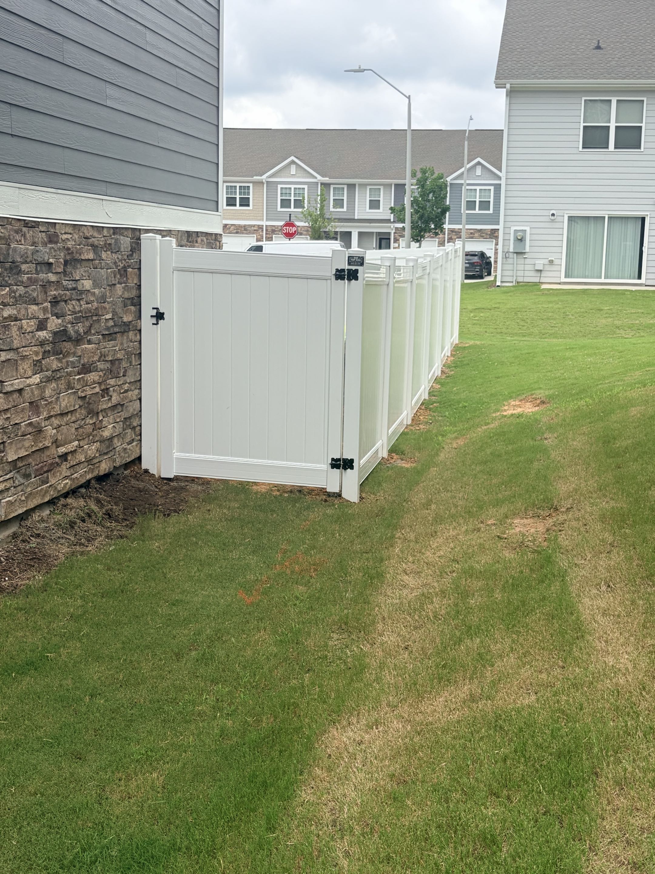 Raleigh, NC - A new 6-foot high privacy fence was installed to enhance safety for a family with a new baby and two dogs. The fence was meticulously measured and planned to ensure it met the family's needs. The materials used were of high quality, providing durability and longevity. The final product not only offered privacy but also created a secure environment for the family's little ones and pets to play safely.