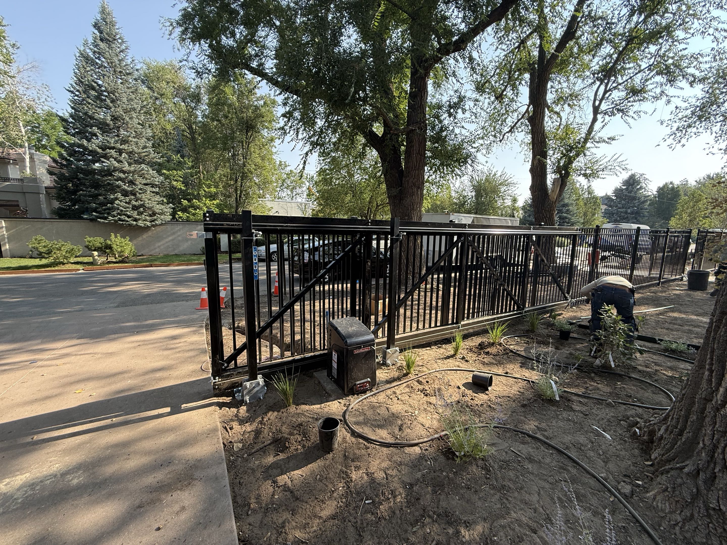Denver, CO - Top Rail Fence finishing up this Ornamental fence and automated gate in Cherry Creek CO!