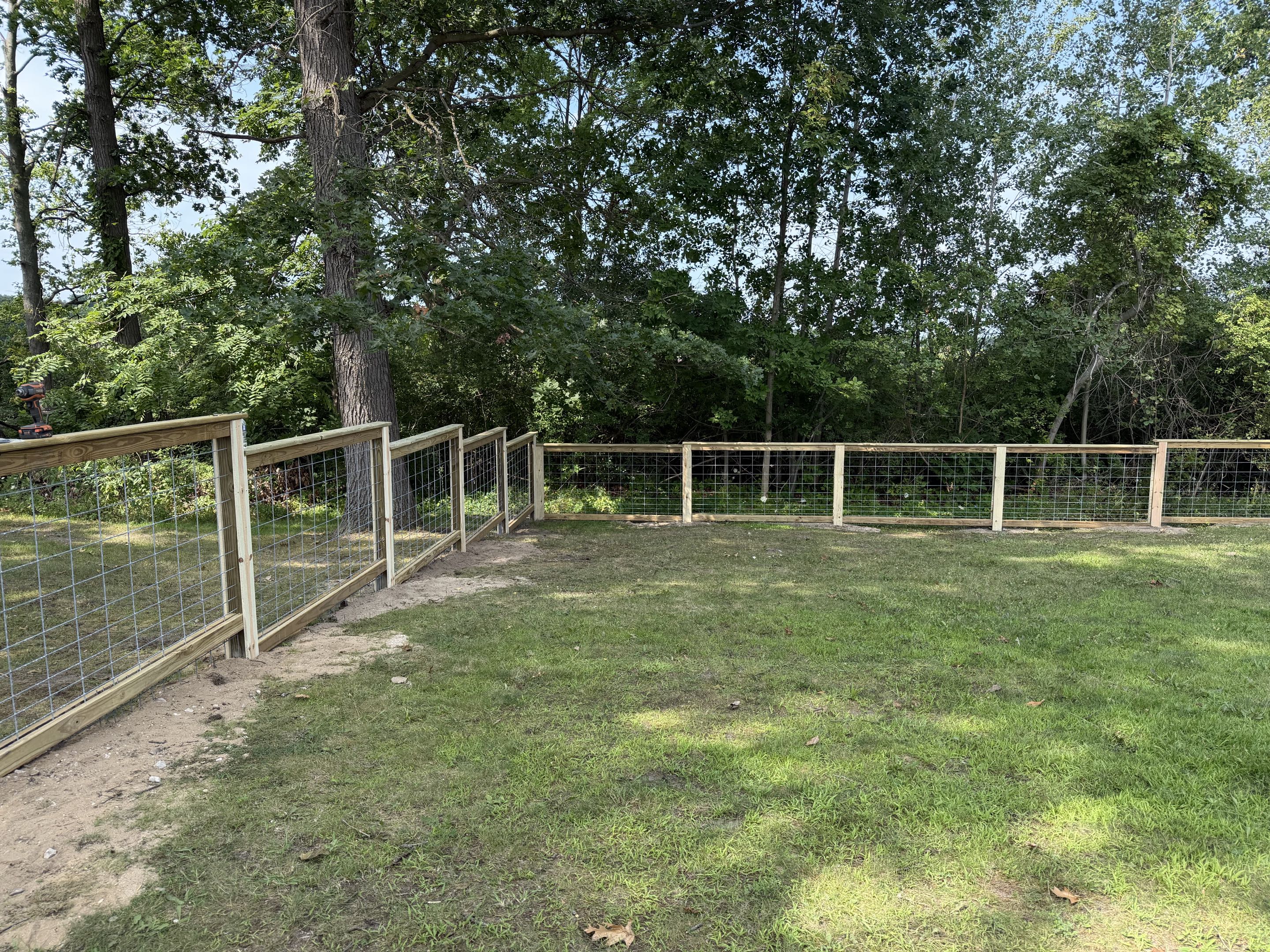 Whitmore Lake, MI - Top Rail Fence Ann Arbor is in Whitmore Lake, Michigan, working on a veterinary clinic’s fence so they can have their patients enjoy the outdoors.