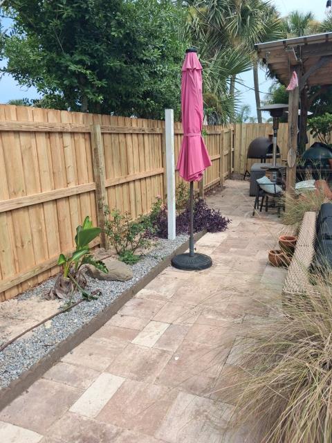 New Smyrna Beach, FL - we had the opportunity to help a couple of neighbors in New Smyrna Beach replace their old, worn-out wooden fences with beautiful new fencing. 