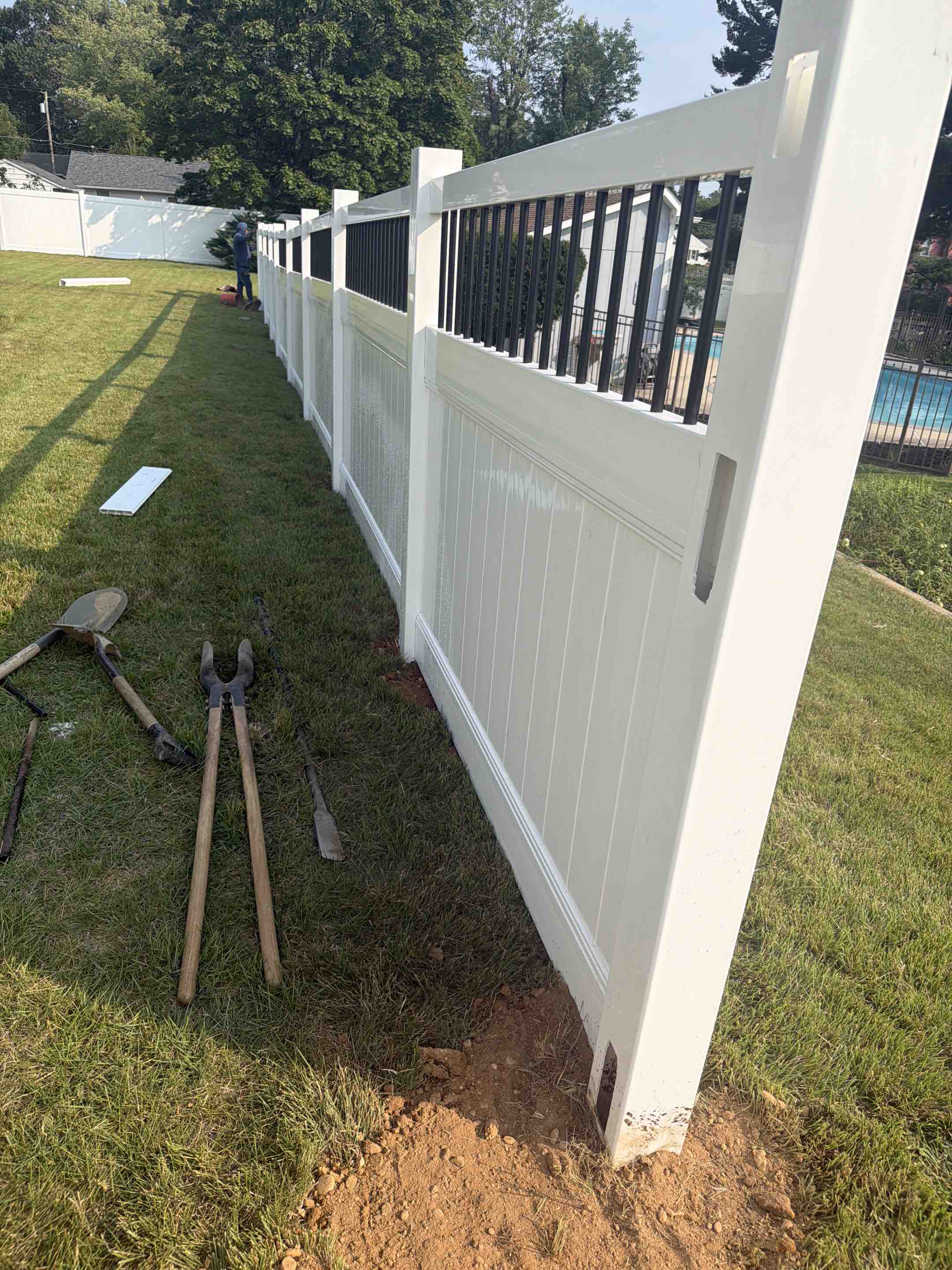 Pitman, NJ - 5’H vinyl with aluminum round spindle top install in progress 