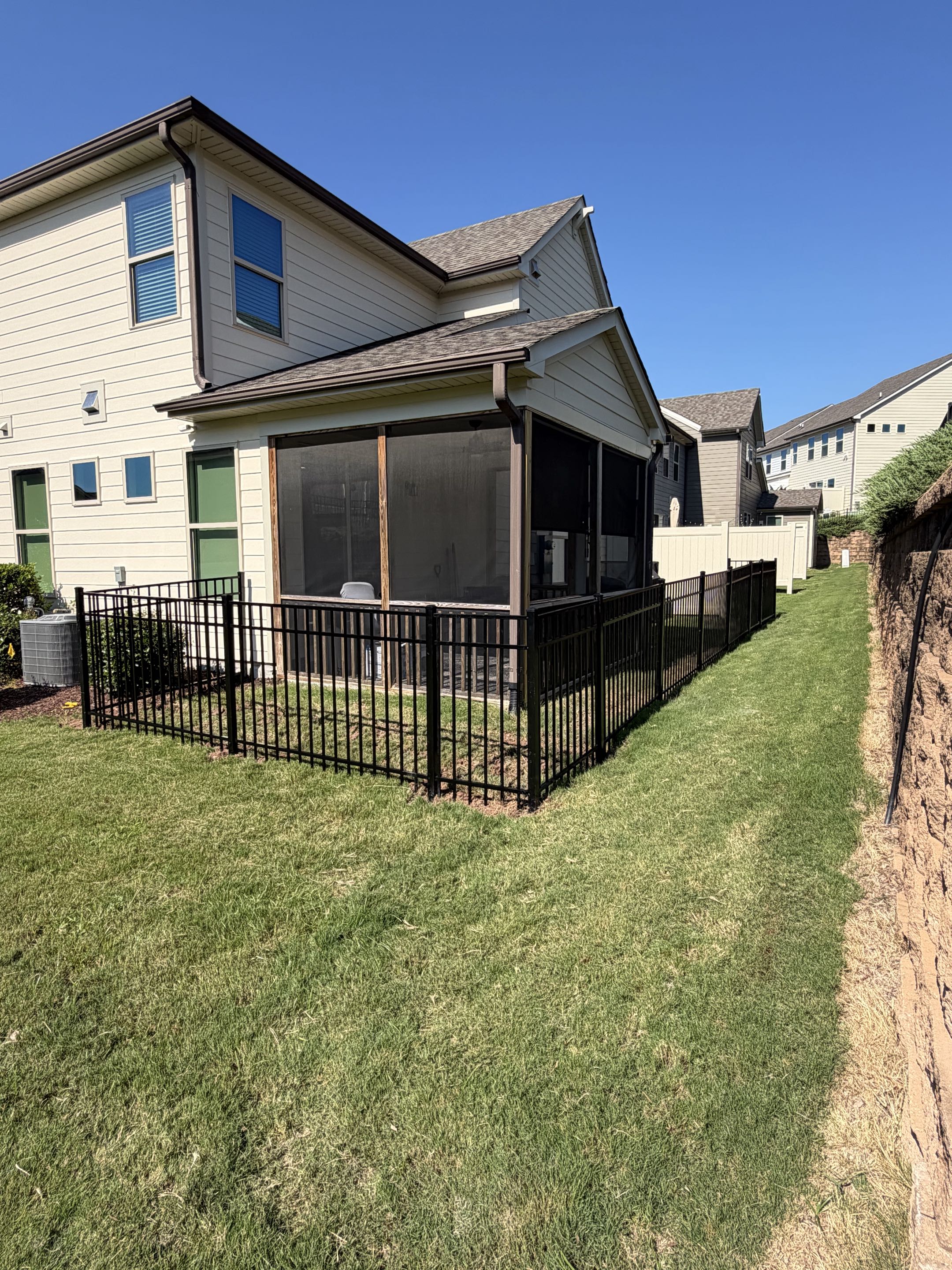 Durham, NC - ☀️🐾 A sunny spot for your favorite furry friend! This new aluminum fence in Durham, NC gives your pet the freedom to enjoy the outdoors while keeping your yard secure and stylish. Durable, low-maintenance, and built to look great for years to come! 🏡🐶 #AluminumFence #DurhamNC #PetFriendly #FenceInstallation #BackyardGoals