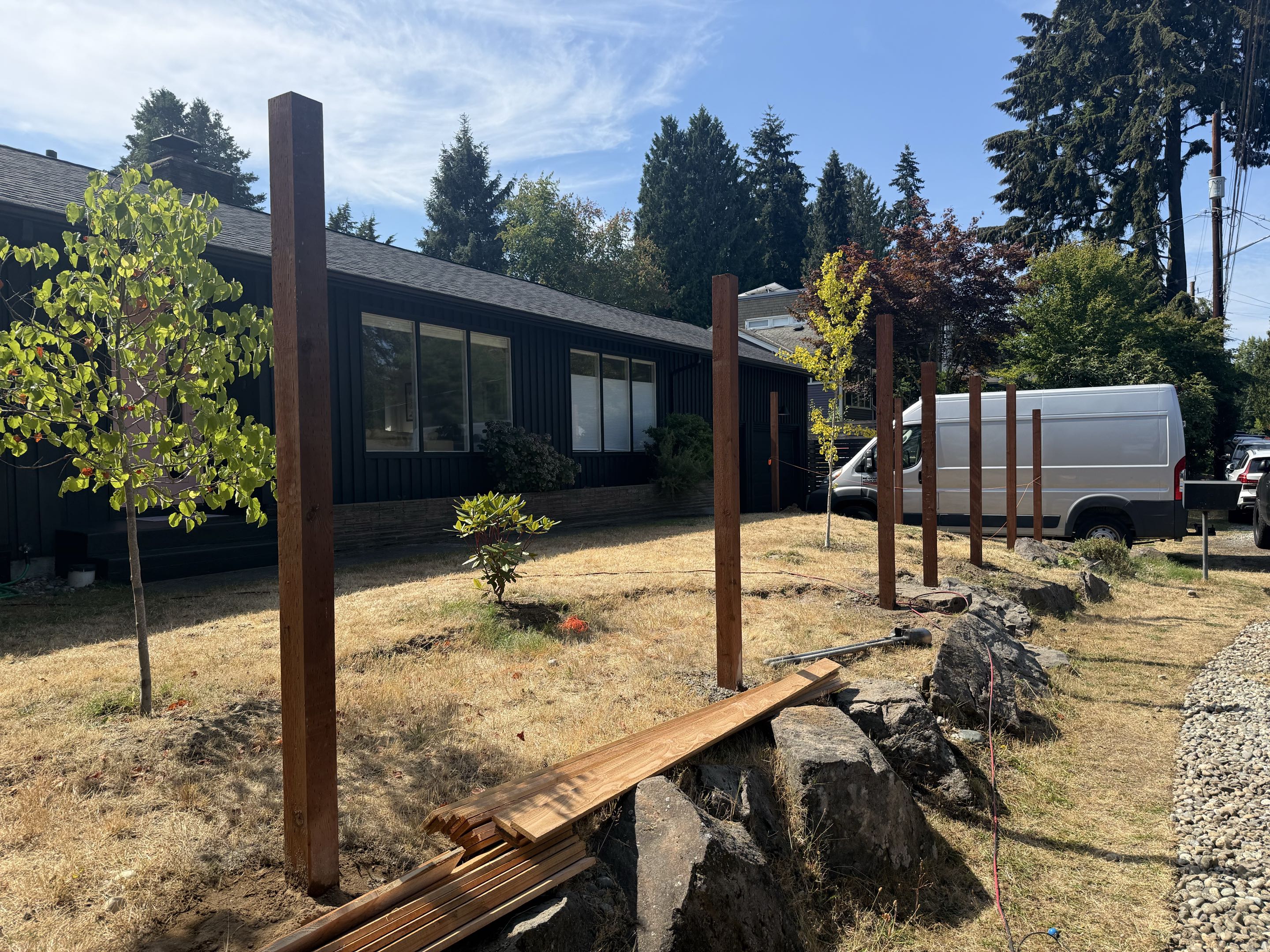 Seattle, WA - Posts are in for a horizontal fence in Northgate.