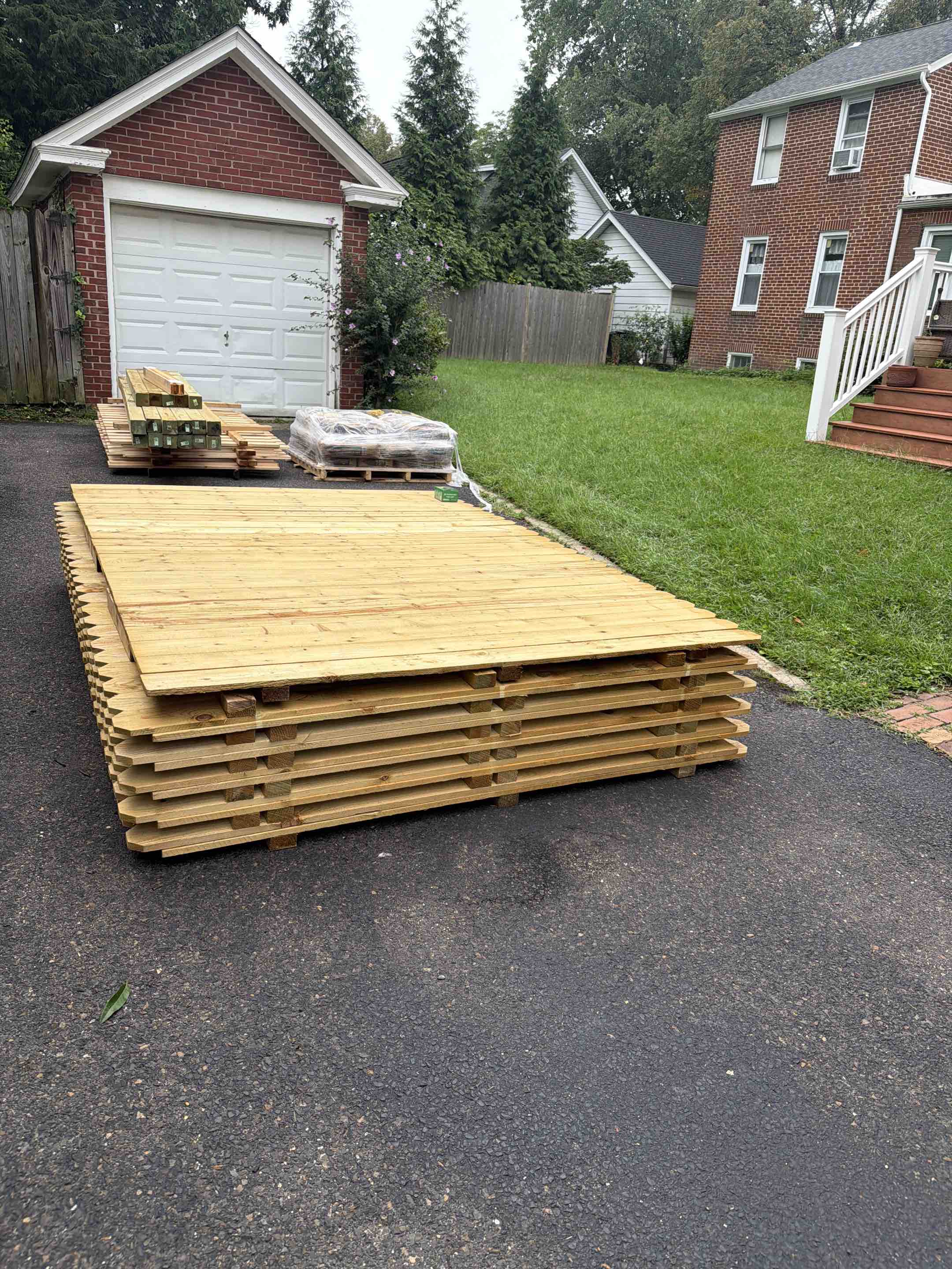 Haddonfield, NJ - Mixed wood type installation today. 6’ high pressure treated privacy wood fence in back yard, 4’ high cedar in front yard.