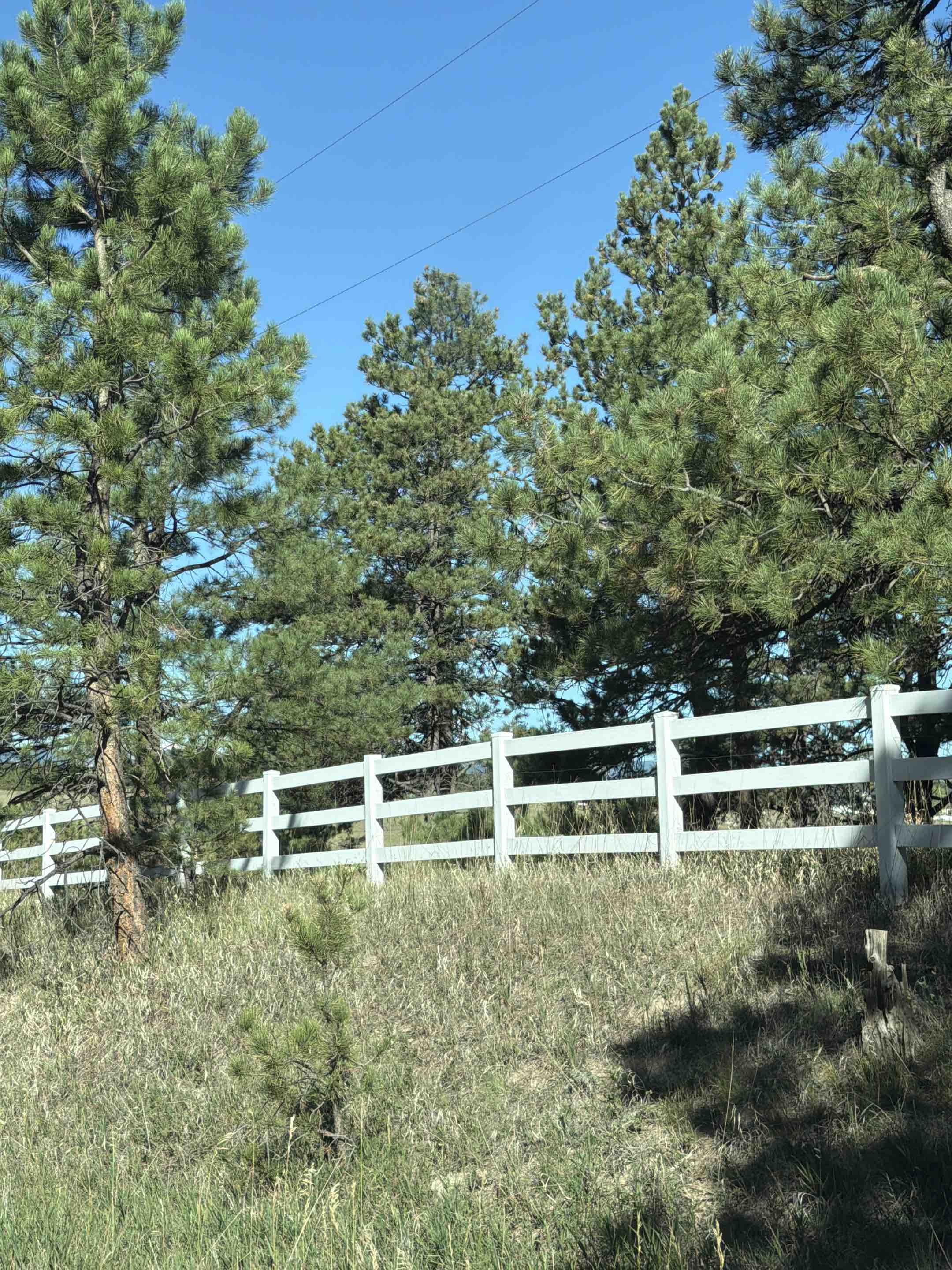 Colorado Springs, CO - Top Rail Fence is in Colorado Springs doing free estimates for Vinyl Ranch Rail Fencing!