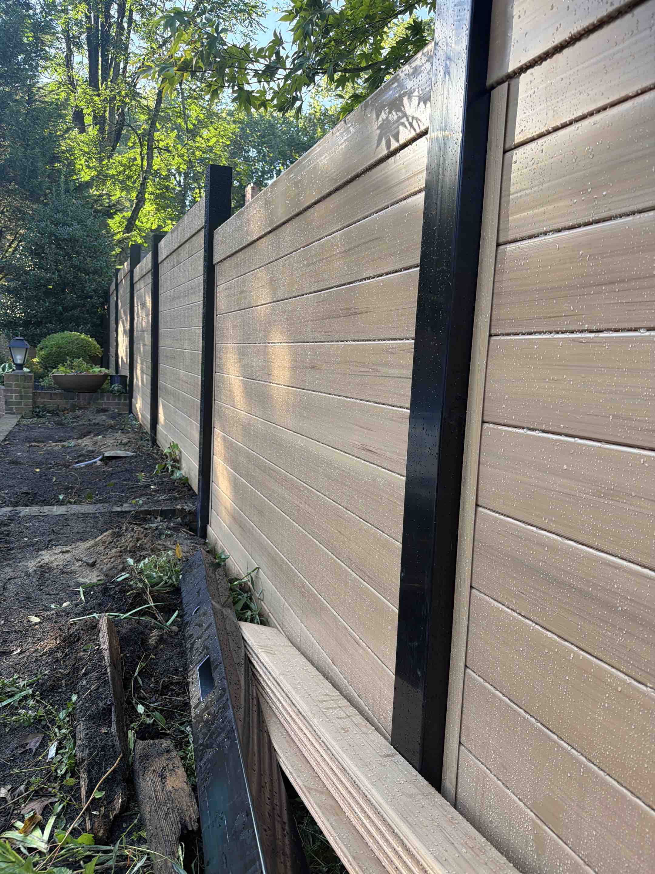 Cherry Hill Township, NJ - Wrapping up Cypress wood grain vinyl privacy fence.