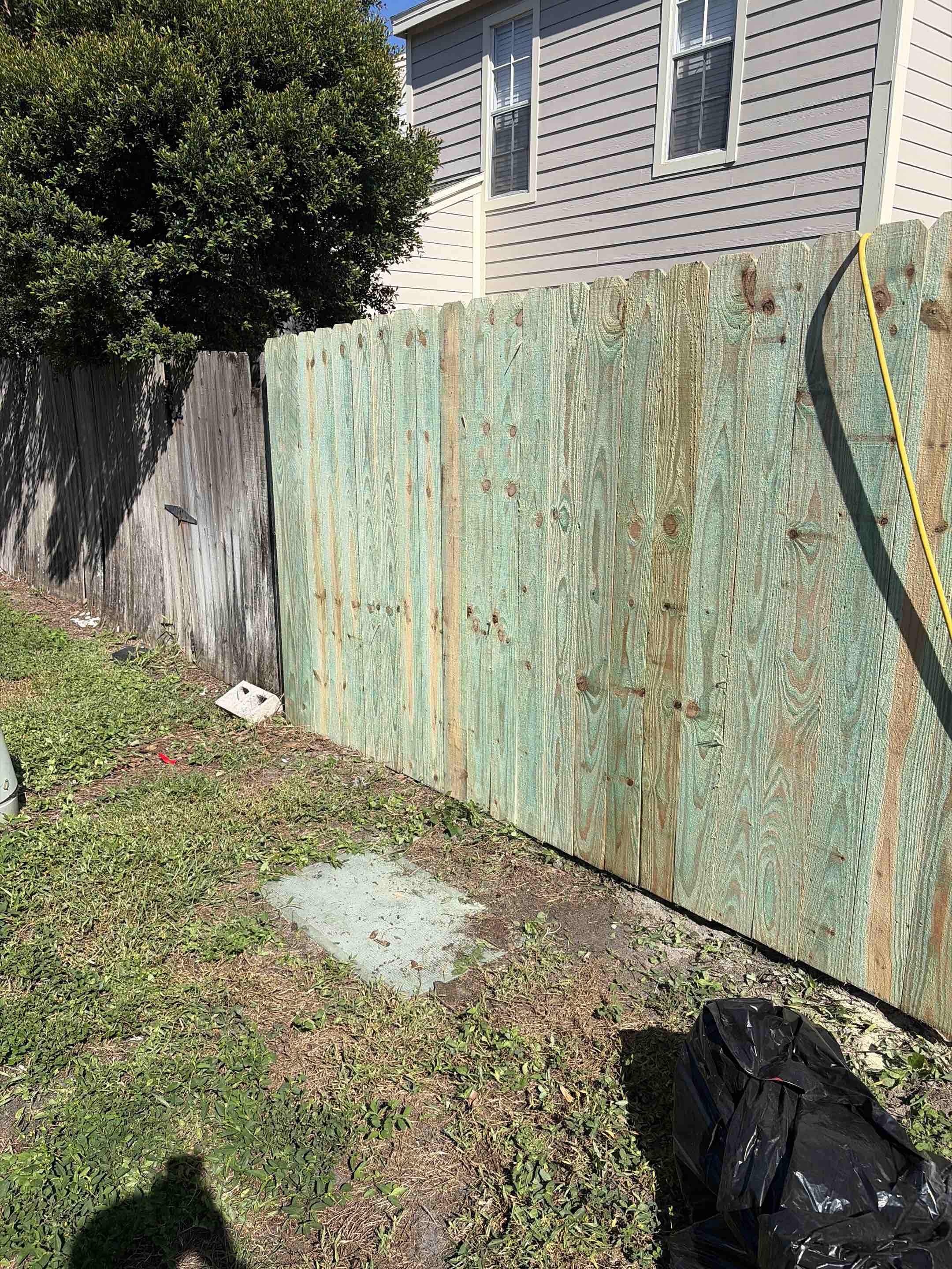 Tampa, FL - A fresh, meticulously crafted wood fence transformed the property's appearance and security. Each plank was carefully selected and treated to ensure durability and beauty. The fence was designed to complement the existing landscape, enhancing the overall aesthetic. Precision in measurement and installation guaranteed a perfect fit, providing both privacy and a sense of seclusion. The attention to detail in the finishing touches, such as the smooth edges and secure fastenings, showcased a commitment to quality. This new fence not only elevated the property's curb appeal but also offered a reliable barrier, ensuring peace of mind.