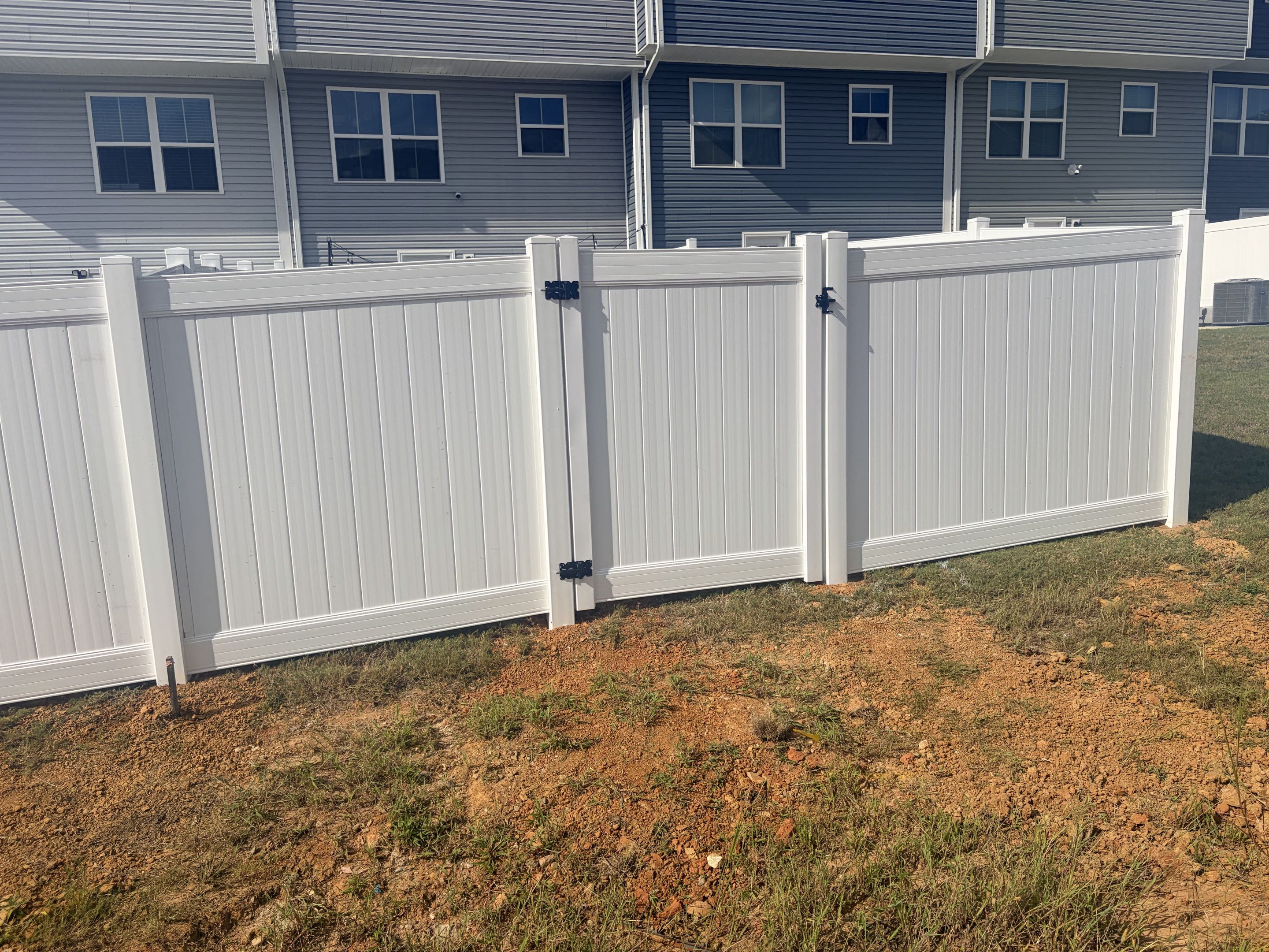 Raleigh, NC - Our team successfully completed the installation of an 80-linear-foot white vinyl privacy fence, standing at a height of 6 feet. This elegant and durable fence was meticulously crafted to provide maximum privacy and security. The vinyl material ensures low maintenance and resistance to the elements. A single gate was incorporated into the design, offering convenient access while maintaining the fence's aesthetic appeal. The installation process involved precise measurements, careful planning, and expert craftsmanship to ensure a seamless and visually pleasing result.