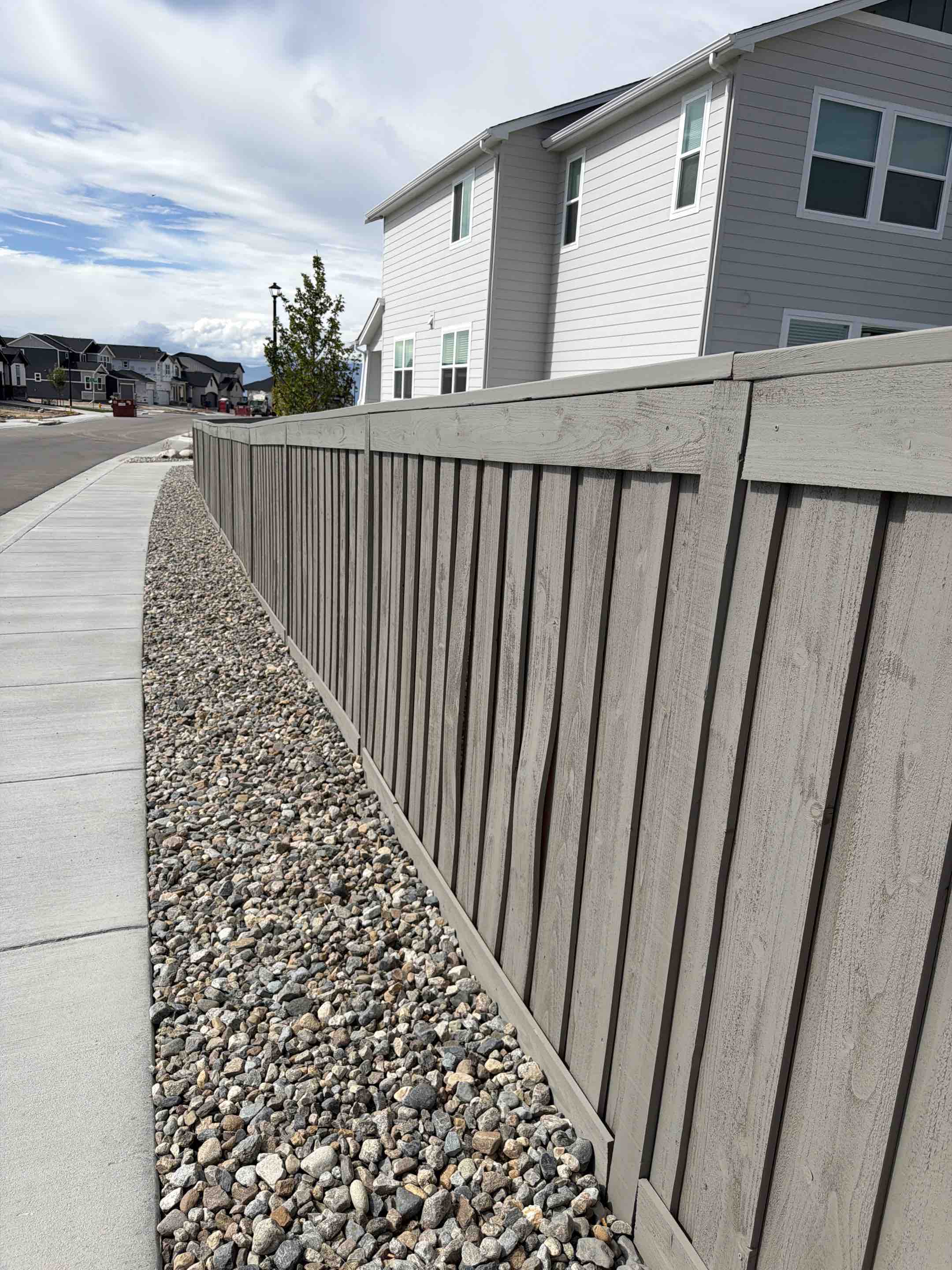 Colorado Springs, CO - Top Rail Fence is in Colorado Springs doing free estimates for Stained Cedar Board on Board Fencing!