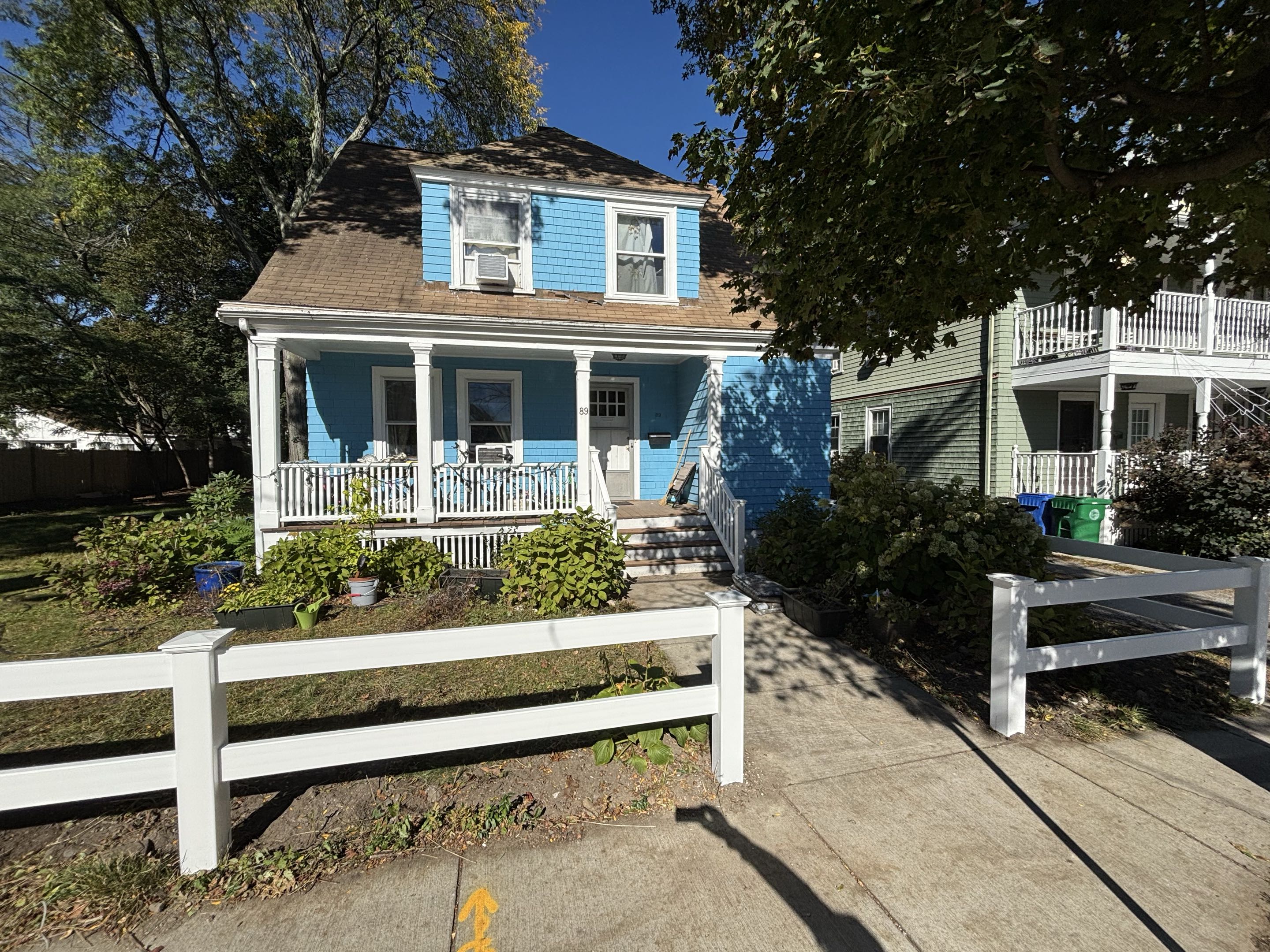 Newton, MA - A thorough transformation was achieved by replacing an old, deteriorated fence with a new, durable vinyl two-flat rail fence. The old fence, riddled with rot and wear, was carefully removed and disposed of. The new vinyl fence was then installed, ensuring a seamless and modern look. Additionally, the stair railings were replaced with new vinyl railings, enhancing both safety and aesthetics. The new railings were meticulously measured, cut, and installed to provide a sturdy and stylish upgrade. The entire project was completed with precision, resulting in a refreshed and secure environment.