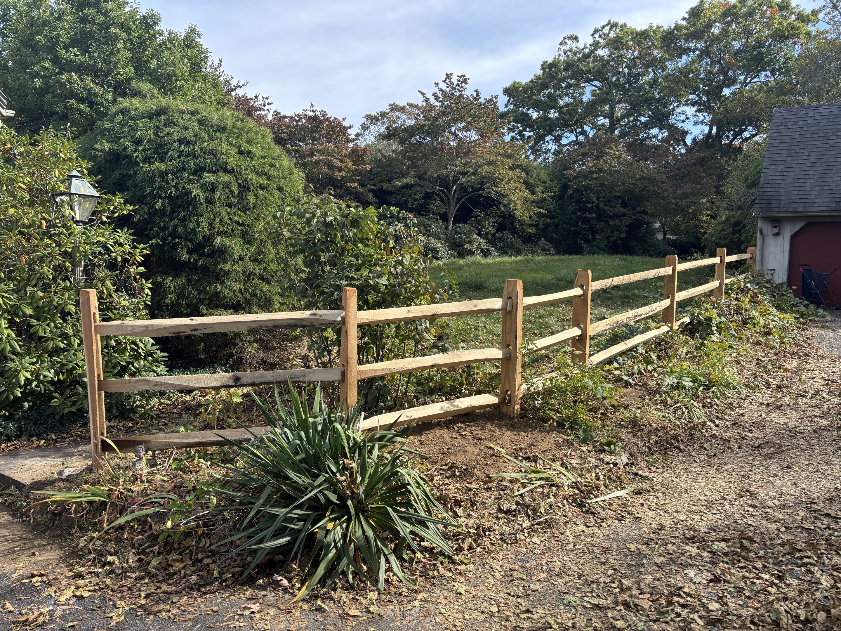 Dover, MA - We completed the installation of a new three-rail split rail fence, meticulously crafted from premium materials. Each rail was carefully selected and treated for durability and visual appeal. The fence boasts a rustic design, enhancing the charm of the property.
