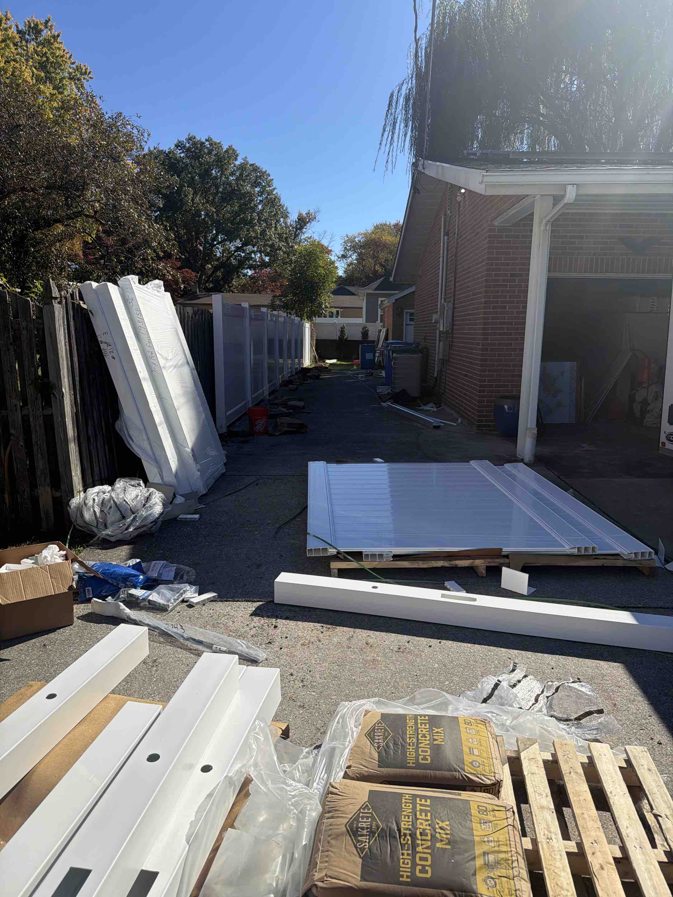 Cherry Hill Township, NJ - White vinyl/pvc solid privacy fence installation today. 