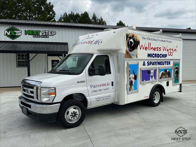 We are pet lovers over here at NXS and so we jumped at the chance to help Wellness Waggin' continue their admirable mobile work for our special furry friends. We were tasked with working with the client to come up with a fresh new design that was functional. We had fun finding bright (and cute!) images that make it crystal clear what they do and how to get in touch. This transport van now doubles as a work space and a mobile billboard!

