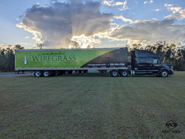 We wrapped five semi trucks for Wiregrass Technical College in Valdosta, Ga. It was a huge job that required a lot of collaboration, and we are very pleased with the finished product. The semis are now mobile billboards that will promote Wiregrass Technical college both on the road and in the lot. 
We wrapped five semi trucks for Wiregrass Technical College in Valdosta, Ga. It was a huge job that required a lot of collaboration, and we are very pleased with the finished product. The semis are now mobile billboards that will promote Wiregrass Technical college both on the road and in the lot.