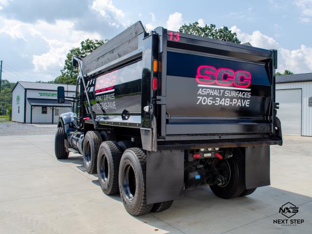We recently completed a job for SCC Asphalt Surfaces. They wanted to add decals to their newest dump truck. The decals were hot pink and white to match the rest of their fleet. 
We recently completed a job for SCC Asphalt Surfaces. They wanted to add decals to their newest dump truck. The decals were hot pink and white to match the rest of their fleet.