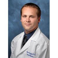 Adrian Ostrzega, MD