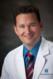 Curtis Malcom, MD