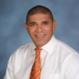 Dr. Carlos Carrazana