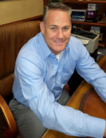 DR. JAMES  R. GLAUSER