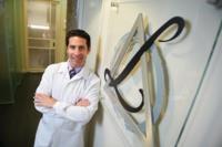Dr Marc E Lazare