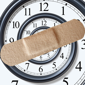 clock covered with a band-aid