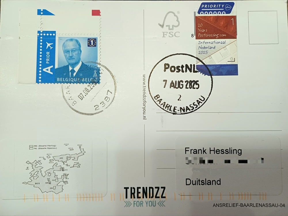 Back of a postcard bearing both Belgian and Dutch stamps with a Baarle-Nassau postmark and a small enclaves map.