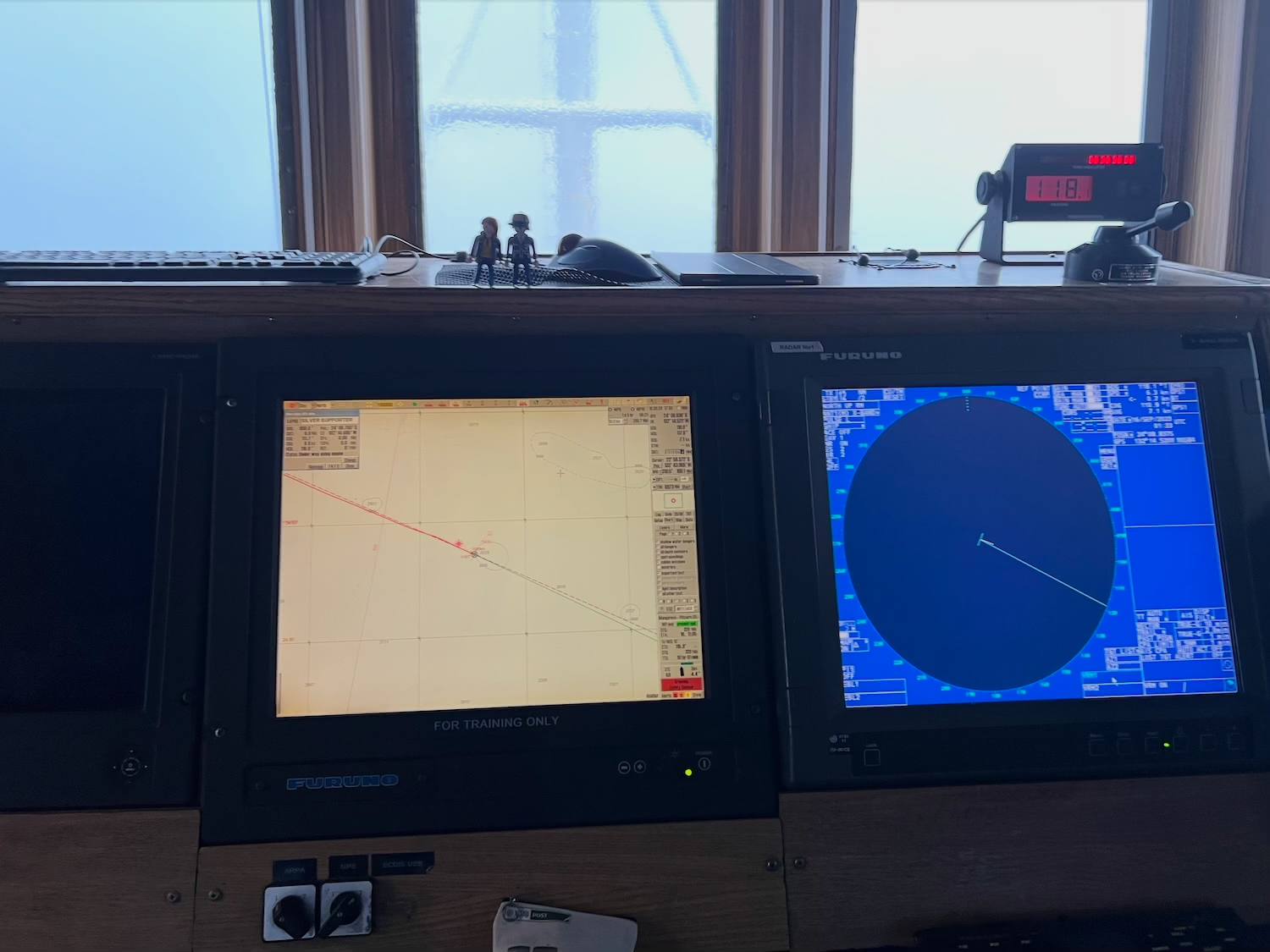 Computer screens and navigation equipment on the bridge of the Silver Supporter during the voyage to Pitcairn.