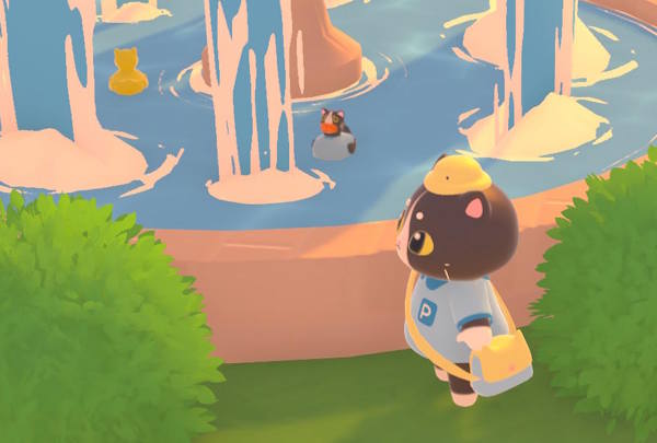 Screenshot from Catto's Post Office, showing a black-and-white cartoon cat dressed in a postal worker uniform, next to a fountain with some rubber ducks floating in it