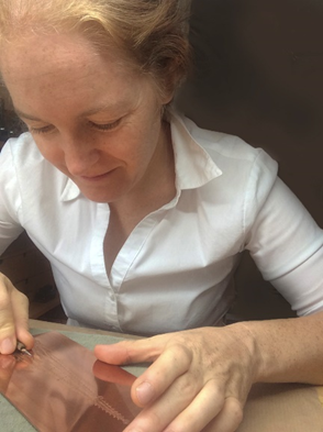 A photo of Lubach working on engraving