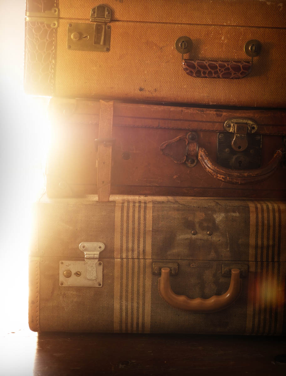 Closeup of stacked retro suitcases StockFreedom Premium Stock