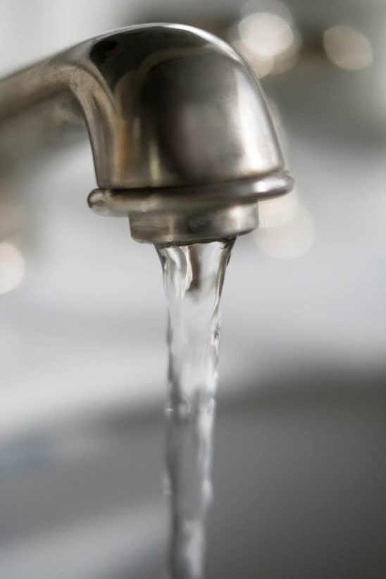 Water running from faucet StockFreedom Premium Stock Photography