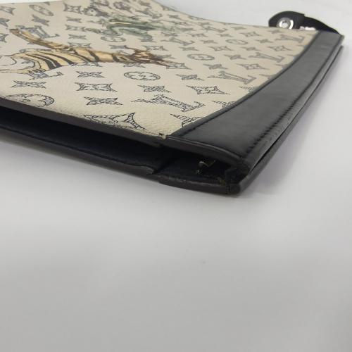 Louis Vuitton Limited Edition Savanna Monogram Print Chapman Brothers Pochette Voyage photo 6