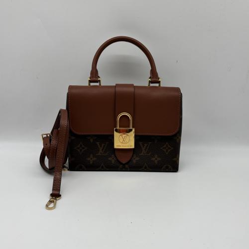 Louis Vuitton Monogram Locky Leather Handbag