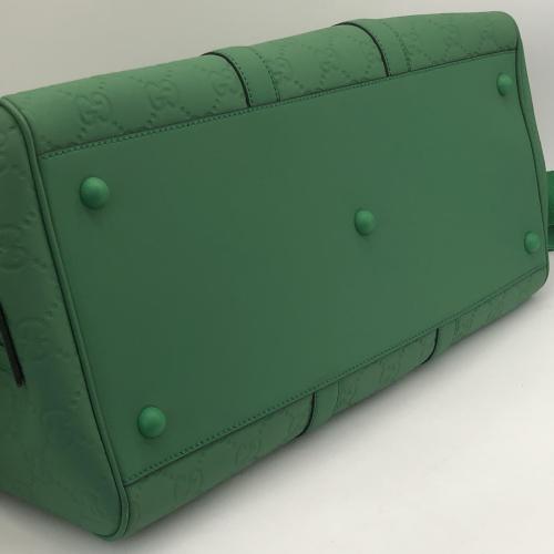 Gucci Green GG Embossed Duffle Bag photo 3