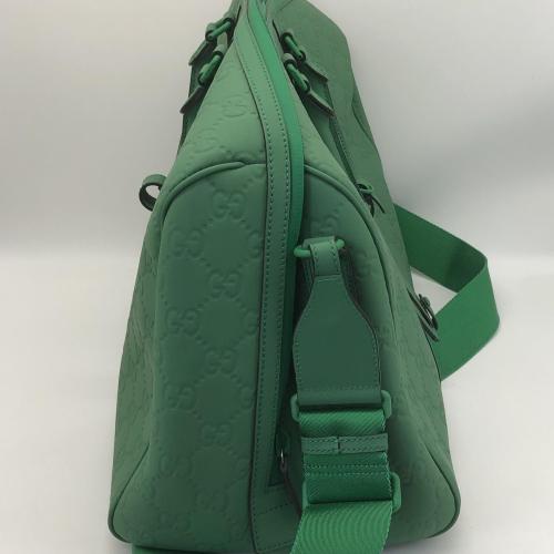 Gucci Green GG Embossed Duffle Bag photo 7