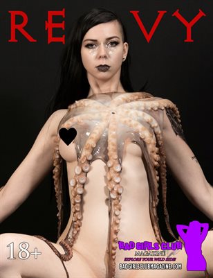 Revy - Sexy Busty Goth Babe with Tattoos from Australia Poses with a Menacing Octopus Squid with an Enticing Stare