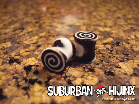 Black Vortex Swirl Saddle Plug