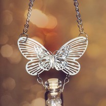 butterfly and pearl bead glass vial pendant