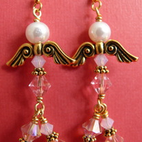 Pink pearls and crystal angel earrings