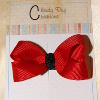 Red bow w/black center