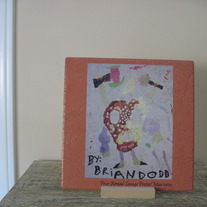 Decorative tile with Four Armed Savage Pretzel Man
